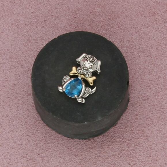 sterling silver & 14k gold dog bone & blue topaz dog pendant